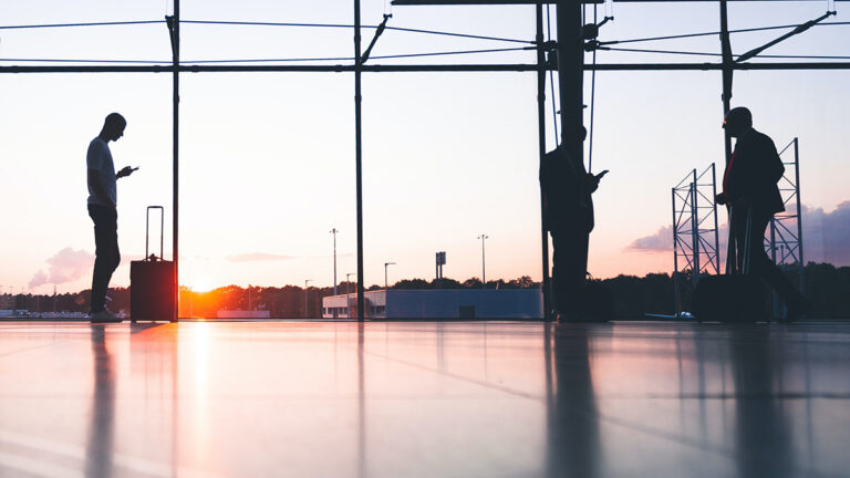 people standing on cell phones