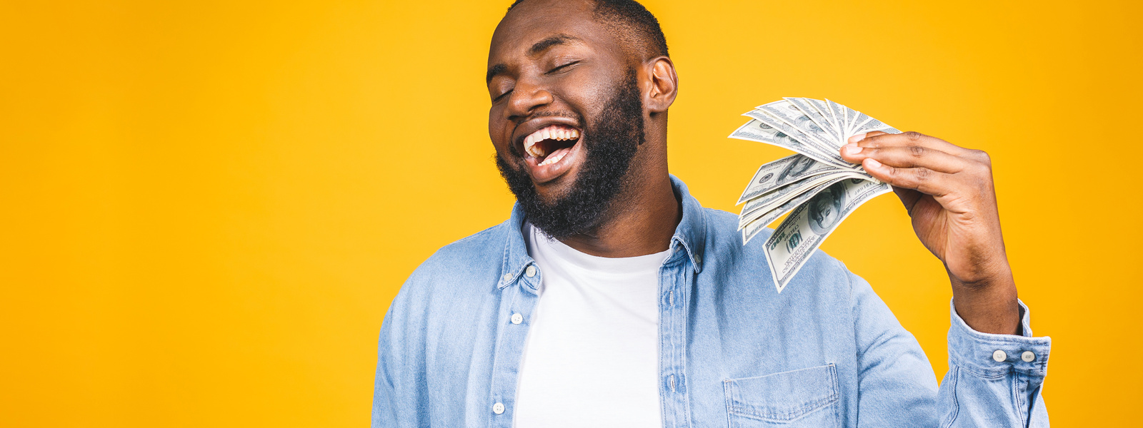 Man fanning with money